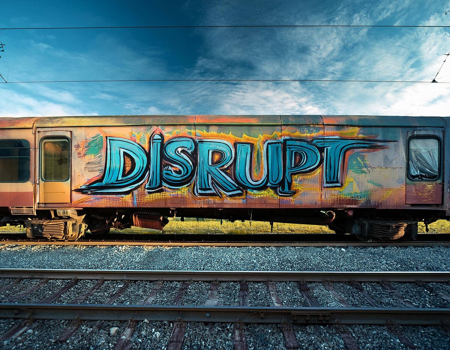 Defy words spray painted on a brick wall
