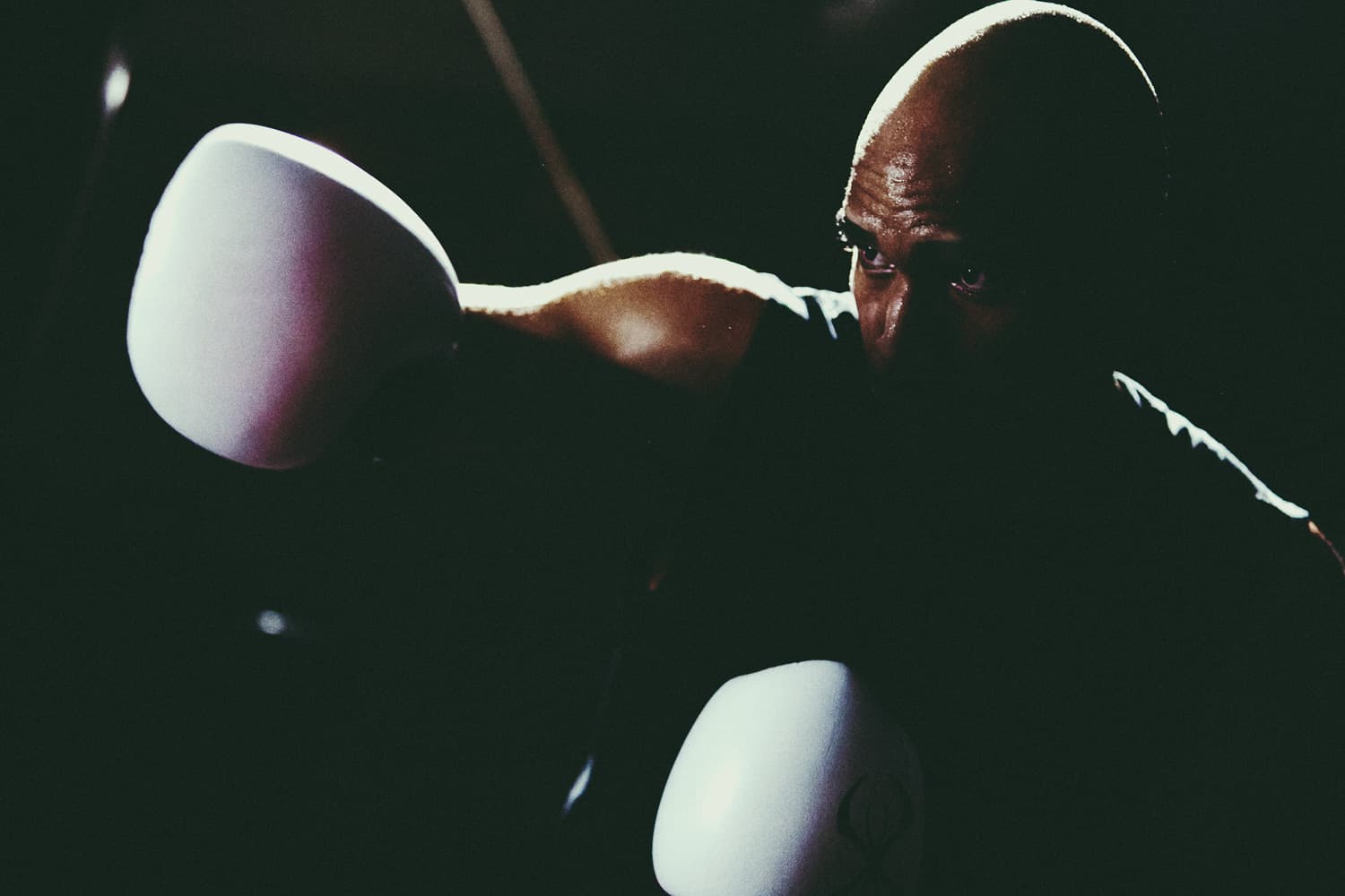 Boxer hitting punching bag