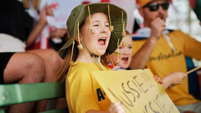 Young Australian sports supporter cheering