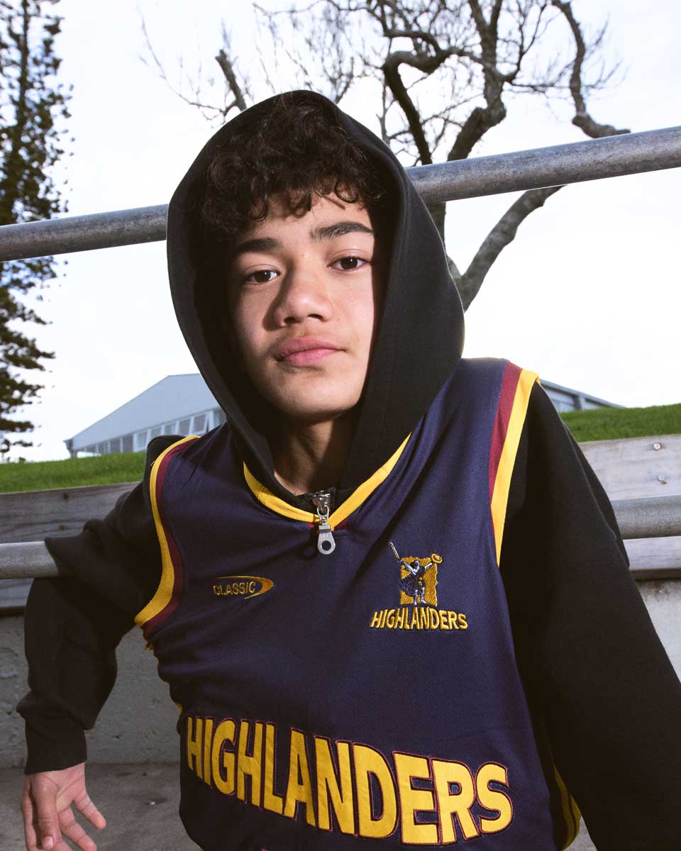 A boy in a highlanders vest